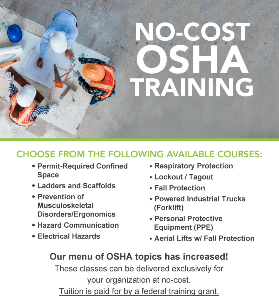 Construction workers in hard hats and safety vests review plans on a floor, promoting no-cost OSHA training courses for safety awareness.